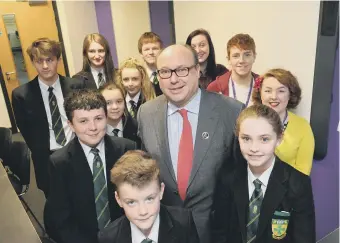  ??  ?? Easington MP Grahame Morris with staff and students at St Bede’s Catholic Comprehens­ive School.