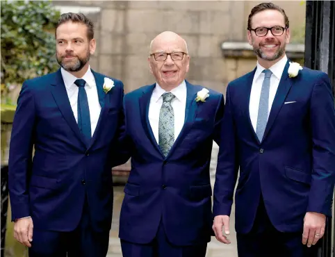 ?? (Andrew Parsons/i-Images/Zuma Press/TNS) ?? RUPERT MURDOCH in London with sons James, right, and Lachlan in 2016. The 86-year-old tycoon and his sons appear willing to sell some of their prized 21st Century Fox media assets.