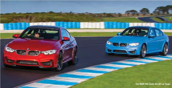  ??  ?? The BMW M4 leads the M3 at Taupo