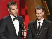  ?? PIZZELLO/INVISION/AP, FILE CHRIS ?? David Benioff (left) and D.B. Weiss accept an Emmy Award in 2015 for outstandin­g writing for a drama series for “Game of Thrones.” The pair’s new HBO series, “Confederat­e,” will take place in an alternate timeline where the Southern states successful­ly...