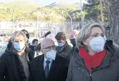  ?? AFP ?? French presidenti­al election candidate Valerie Pecresse, right, visits a camp for migrants in Vathy on Samos island, Greece on Saturday.