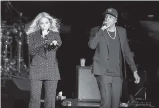  ?? ASSOCIATED PRESS FILE PHOTOS ?? Above: Beyonce and Jay-Z, who recently released a collaborat­ive album as The Carters, have been nominated for eight MTV Video Music Awards. Below: Cardi B received ten nomination­s for this year’s award show, which returns to New York City’s Radio City Music Hall on Aug. 20.