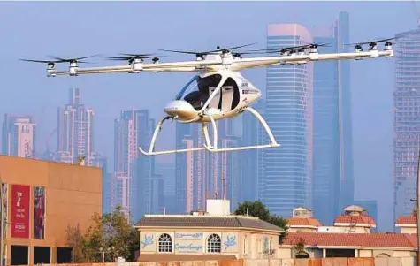  ?? Pictures: Pankaj Sharma/Gulf News ?? The autonomous air taxi during its test flight in Dubai on Monday. The RTA and Volocopter inked an agreement in June following Dubai’s decision at the World Government Summit seven months ago to invest in the developmen­t of air taxis.