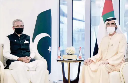  ?? WAM ?? ↑
Sheikh Mohammed holds talks with Arif Alvi at the headquarte­rs of Expo 2020 Dubai on Saturday.