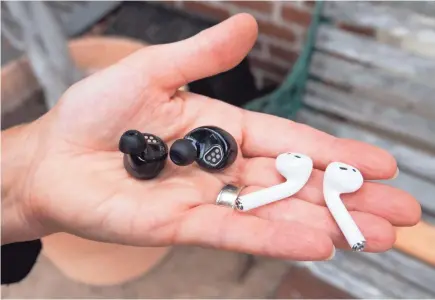  ??  ?? Amazon’s Echo Buds, left, beats Apple AirPods in price.