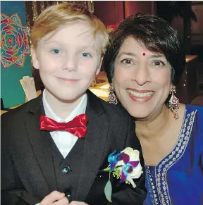  ??  ?? Eight-year old Stuart Sanderson shared his story of living with cystic fibrosis with attendees at the 65 Roses Gala, an East-MeetsWest-themed affair co-emceed by Belle Puri.