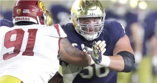  ?? CARLOS OSORIO/ AP ?? Standout guard Quenton Nelson, who played for offensive- line coach Harry Hiestand at Notre Dame, would fill a big hole for the Bears.