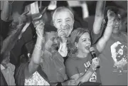  ?? AFP ?? Gleisi Hoffmann (second from right), Brazilian senator and president of the Workers' Party, speaks during the national convention, in Sao Paulo, Brazil on Saturday.