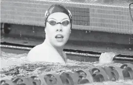  ?? [PHOTO BY DOUG HOKE, THE OKLAHOMAN] ?? Edmond Memorial’s Katie Callahan finishes the freestyle anchor on the 200 IM earlier this season.