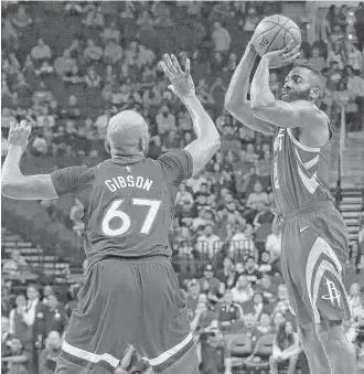  ?? Yi-Chin Lee / Houston Chronicle ?? The ability of James Harden, right, and his Rockets cohorts to find the range from 3-point land will help dictate their first-round success against Taj Gibson and the Timberwolv­es.