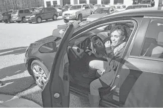  ?? Astrid Riecken / Washington Post ?? Janqueshia Gay, 27, of Baltimore sits in the Chevy she won at Destiny Church in Columbia, Md. The goal of the free-car promotion was to drum up attendance after the church relocated.