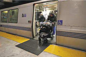  ?? Scott Strazzante / The Chronicle ?? Ricky, a homeless man, exits a train at BART’s Civic Center Station on Wednesday. The pandemic has seen a surge in homeless riders on transit systems around the country.