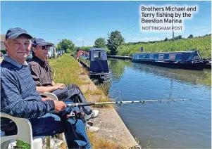  ?? NOTTINGHAM POST ?? Brothers Michael and Terry fishing by the Beeston Marina