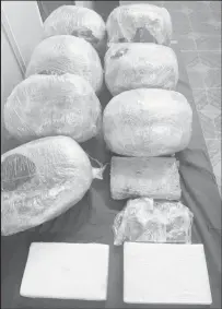  ??  ?? The parcels of cannabis and bricks of cocaine found during the operation
