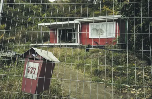  ?? BRADEN FASTIER/STUFF ?? This house on Rocks Rd has been empty and unliveable after it was hit by a slip during extreme rainfall that struck the Nelson region 20 months ago.