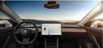  ?? TESLA ?? The Tesla Model 3’s 15-inch touchscree­n display will control many functions, including door locks and side mirrors.