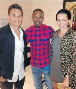  ?? Dan and Honor Carter with Hollywood star Jamie Foxx. ??