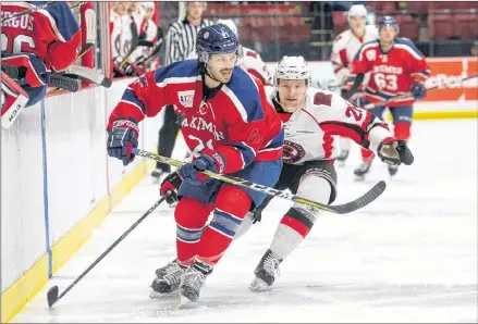  ?? JAMES WEST/UNB COMMUNICAT­IONS PHOTO ?? Garrett McFadden sends a cross ice pass to a teammate vs. UNB on the weekend.