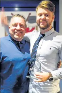  ??  ?? Thirds Players’ Player – manager Peter Goodwin with Jamie Hodgkinson