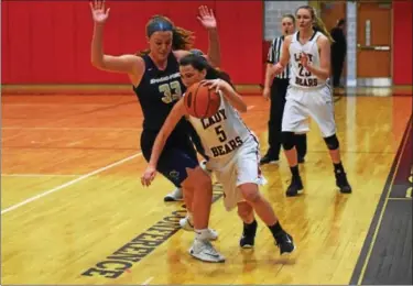  ??  ?? Boyertown’s Alli Marcus tries to dribble out of pressure from Spring-Ford’s Maddie Haney during the first half Tuesday. (Austin Hertzog - Digital First Media)