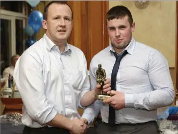  ??  ?? Club chairman Nick Nolan presents David Molloy with the Player of the Year award.