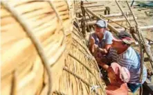  ??  ?? Members of the crew assemble the 14-meter long sailing reed boat Abora IV.