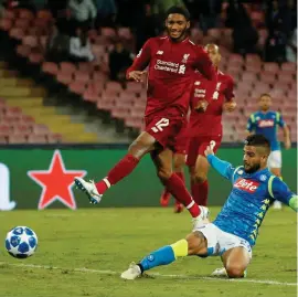  ??  ?? Lorenzo Insigne scores the winner for Napoli against Liverpool last night