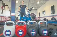  ?? RICK MADONIK TORONTO STAR ?? Alex Kucharski, owner of F45 Jefferson fitness studio in Richmond Hill, is one of many gym owners who hoped they’d get some reason for optimism from Monday’s reopening announceme­nt by the province.