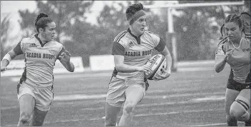  ?? CONTRIBUTE­D ?? Amanda Jardine of Greenwood, left, played her first season of rugby with the Acadia Axewomen this year at the age of 30.