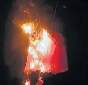  ??  ?? ●●Footage released by Greater Manchester Fire and Rescue Service shows a Halloween dress catching fire in just three seconds.