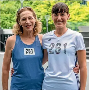  ??  ?? Kathrine Switzer, left, is building an army of runners, including Palmerston North trainer Kate Southern, through her 261 Fearless organisati­on.