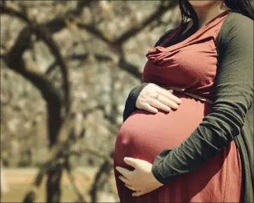  ?? ARTEIDA MJESHTRI — UNSPLASH ?? A new Masshealth program will offer doula care to pregnant and postpartum members.