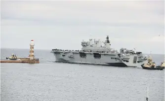  ??  ?? Sunderland’s adopted ship, HMS Ocean, leaving the River Wear.