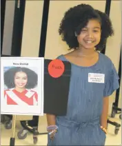  ?? STAFF PHOTO BY JAMIE ANFENSON-COMEAU ?? Zaria Johnson portrays actress, model and activist Yara Shahidi as part of the living history museum at Dr. Gustavus Brown Elementary School Wednesday afternoon.