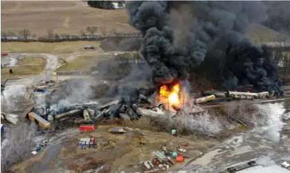  ?? Saturday. Photograph: Gene J Puskar/AP ?? A photo taken with a drone shows portions of a Norfolk and Southern freight train that derailed Friday night in East Palestine, Ohio, still on fire on