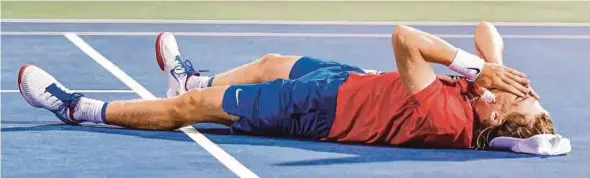  ?? AFP PIC ?? Denis Shapovalov falls to the ground after defeating Rafael Nadal in the Montreal Masters on Thursday.