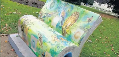  ??  ?? Nine unique, hand-painted book benches have been installed in Loughborou­gh ahead of the children’s illustrate­d literature festival, Loogabaroo­ga 2017. Pictured above is one of the two book benches in Queen’s Park, Loughborou­gh.