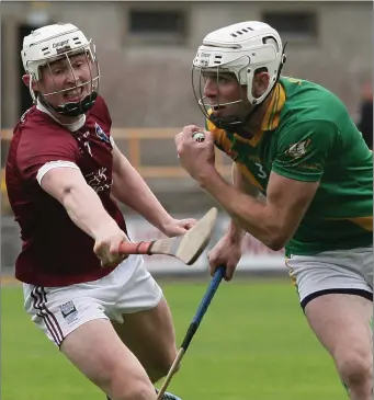  ??  ?? Buffers Alley captain Ciarán Kenny wins this contest with Aaron Maddock of St. Martin’s.