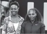  ??  ?? Venus, left, and Serena Williams pose before the women’s singles final at the 2017 Australian Open tennis championsh­ips in Melbourne, Australia.