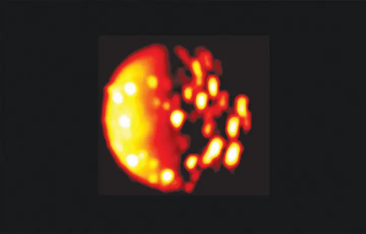  ?? NASA / JPL-CALTECH / SWRI / ASI / INAF / JIRAM VIA THE NEW YORK TIMES ?? An infrared image of Jupiter’s volcanic moon Io’s southern hemisphere was collected by the Juno spacecraft Dec. 16, 2017, at a distance of about 290,000 miles. The brighter the color, the higher the temperatur­e recorded. Recent strange activity around Io confused and excited scientists.