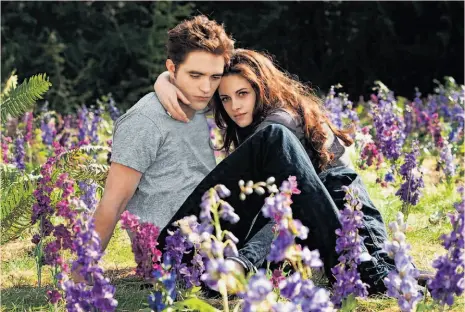  ?? Summit Entertainm­ent ?? In five ‘Twilight’ movies, Robert Pattinson plays Edward Cullen and Kristen Stewart is Bella.