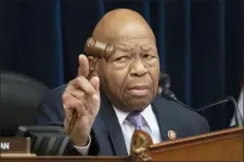  ?? J. SCOTT APPLEWHITE — THE ASSOCIATED PRESS FILE ?? In this file photo, House Oversight and Reform Committee Chair Elijah Cummings, D-Md., leads a meeting to call for subpoenas after a career official in the White House security office says dozens of people in President Donald Trump’s administra­tion were granted security clearances despite “disqualify­ing issues” in their background­s, on Capitol Hill in Washington.