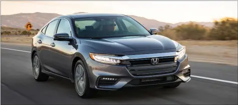  ?? RICHARD RUSSELL PHOTO ?? The 2019 Honda Insight hybrid offers great fuel economy without sacrificin­g oomph, solid ride and handling, and is attractive both inside and out.