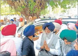  ?? SIMRANJIT SINGH MANN HT PHOTO ?? SAD (A) candidate Simranjit Singh Mann greets people after winning the Sangrur LS bypoll on Sunday. For the past 20 years, the radical leader had been on the margins of Punjab politics.