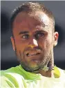  ??  ?? Marius Copil: put up strong resistance in the first set.