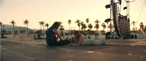  ??  ?? Bradley Cooper, left, stars as grizzled rock star Jackson Maine alongside Lady Gaga as aspiring singer-songwriter Ally in ‘A Star Is Born’. — Warner Bros. Pictures photos