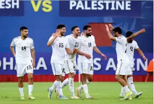  ?? AFC ?? Palestine players celebrate their victory on Tuesday. —