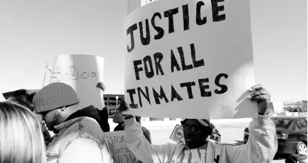  ?? AP ?? Prisoner advocates hold signs supporting inmate rights at a protest outside the Capitol in Jackson, Mississipp­i on Tuesday.