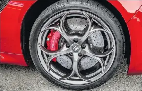  ?? — FCA ?? Optional carbon ceramic Brembo discs help make the 2017 Alfa Romeo Giulia Quadrifogl­io a veritable track terror.