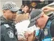  ?? Picture: NINE NEWS ?? Police arrest a man outside the Surfers Paradise Beer Garden.